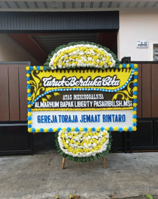 Papan Bunga Duka di Sosorgadong